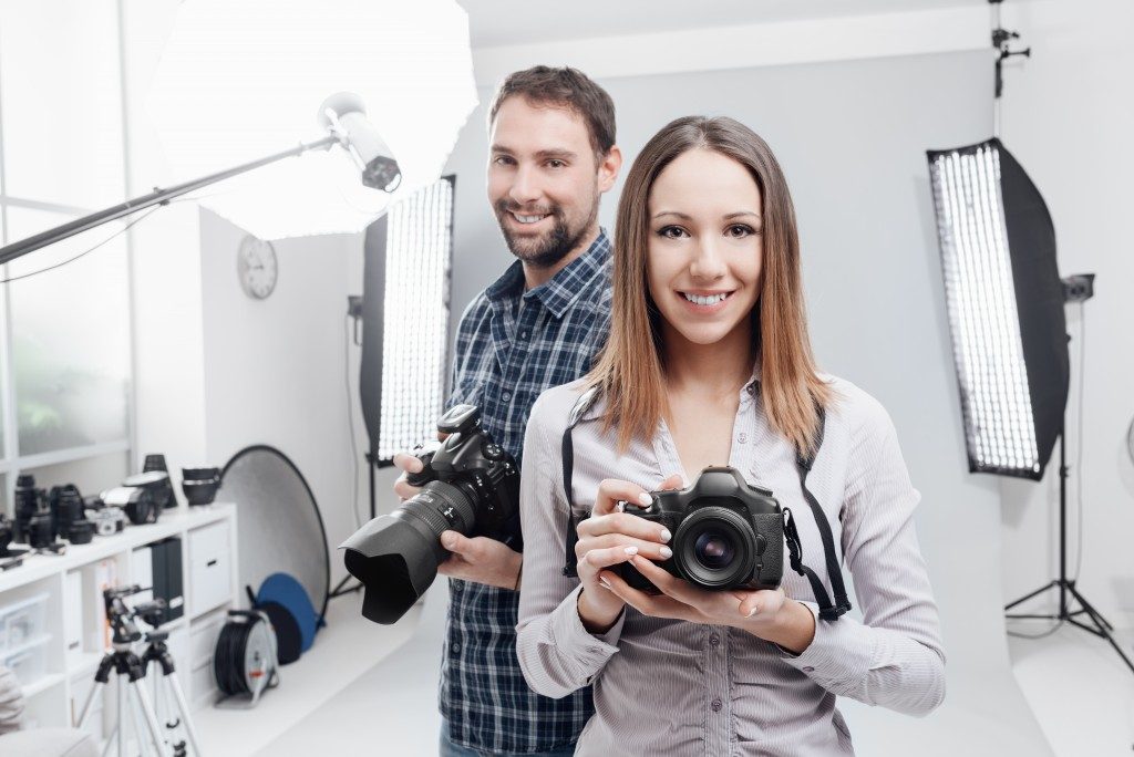 Professional photographers in a studio