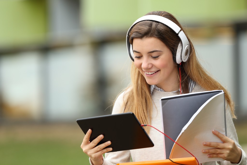 Woman watching video tutorial on her tablet